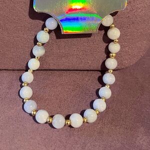 White greyish beads bracelet with gold filled